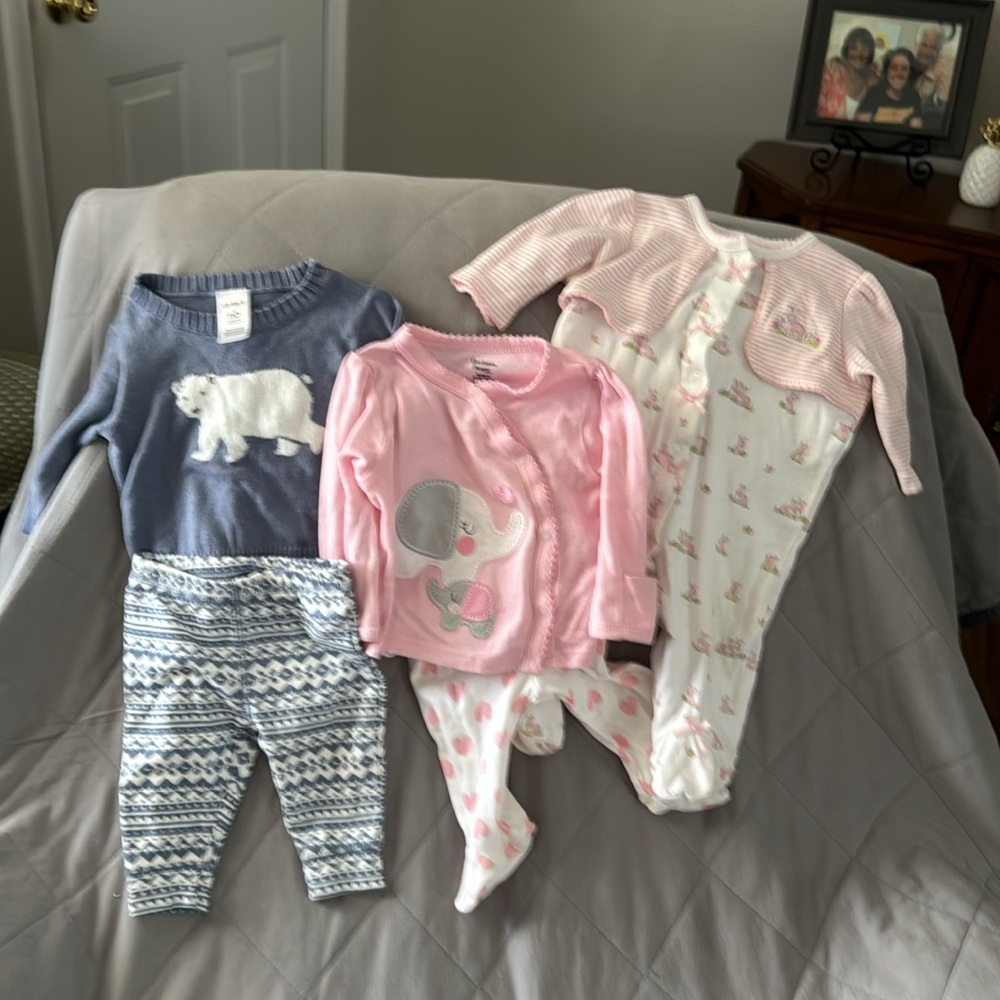 3 newborn outfits. A Gerber, Carters & little me